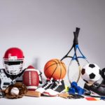 Pile of sporting equipment against a white background