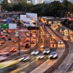 Busy freeway and tollway at dusk