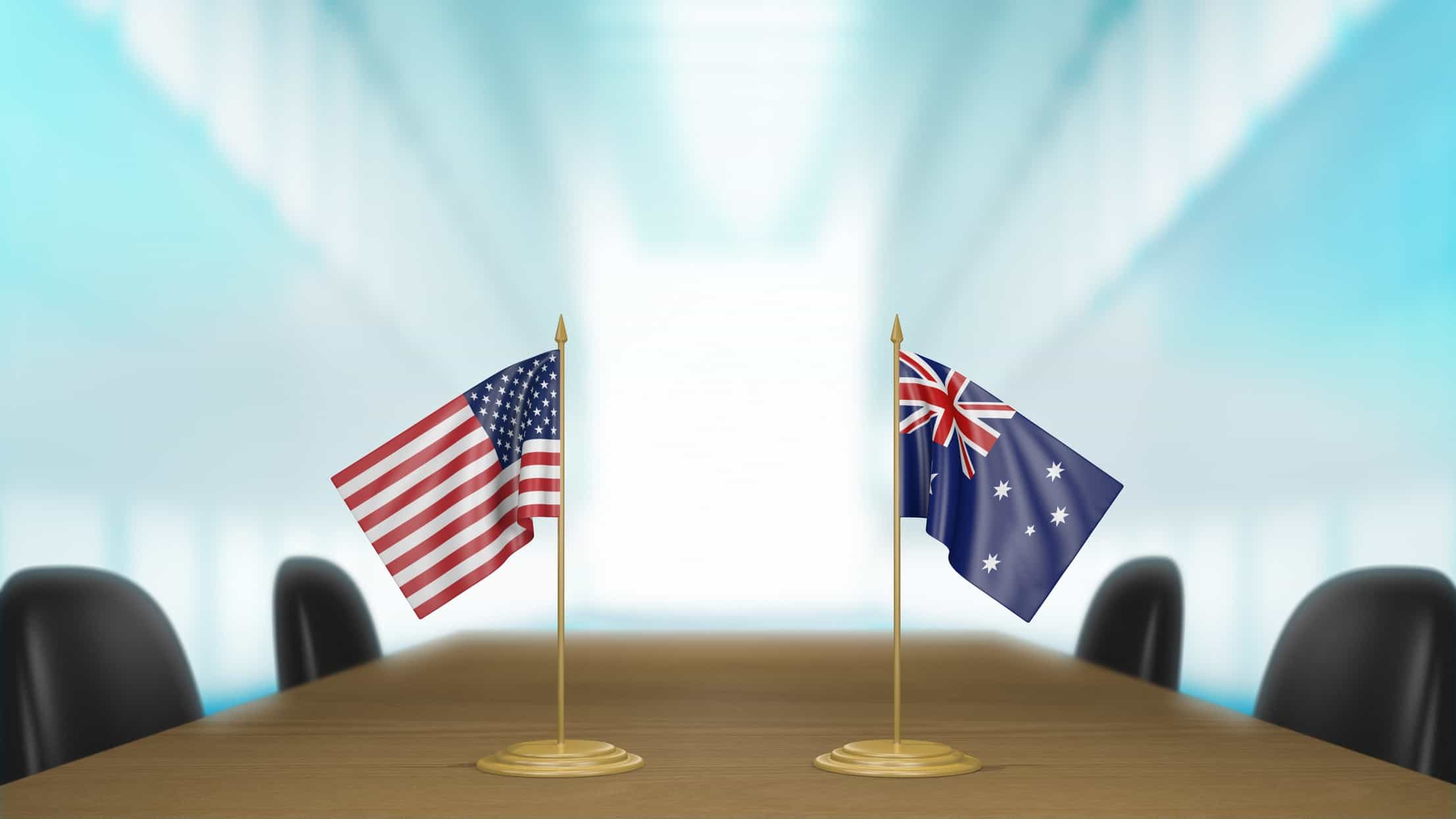 australian and american flags on boardroom table