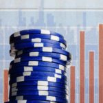 asx blue chip shares represented by pile of blue casino chips in front of bar graph