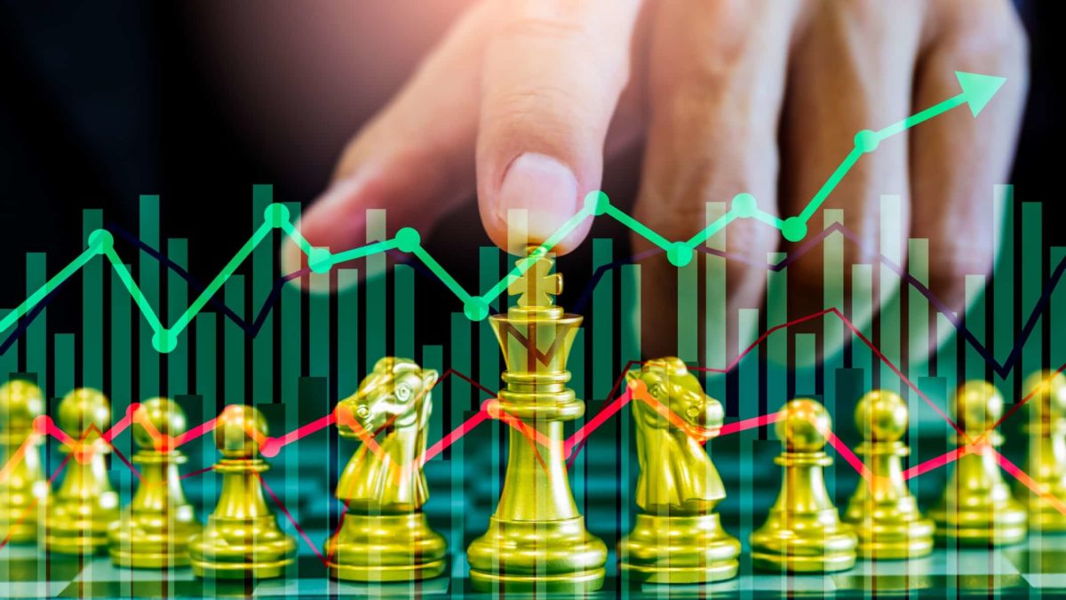 Share investor with chess pieces deciding to buy or sell ASX shares