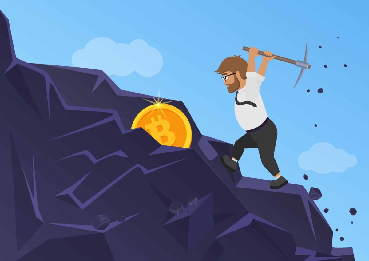 cartoon of a miner digging a bitcoin out of rock