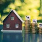 model house and reducing stacks of coins with percentages, house prices asx