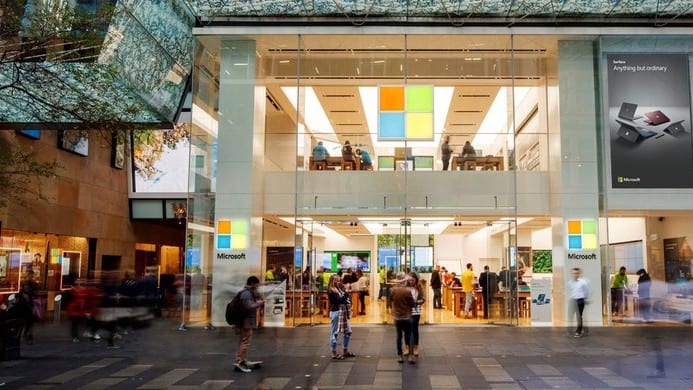customers inside and outside a Microsoft retail store