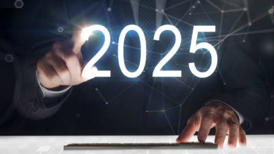 business man touching digits 2025 on digital screen