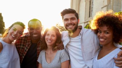 group of adult friends smiling