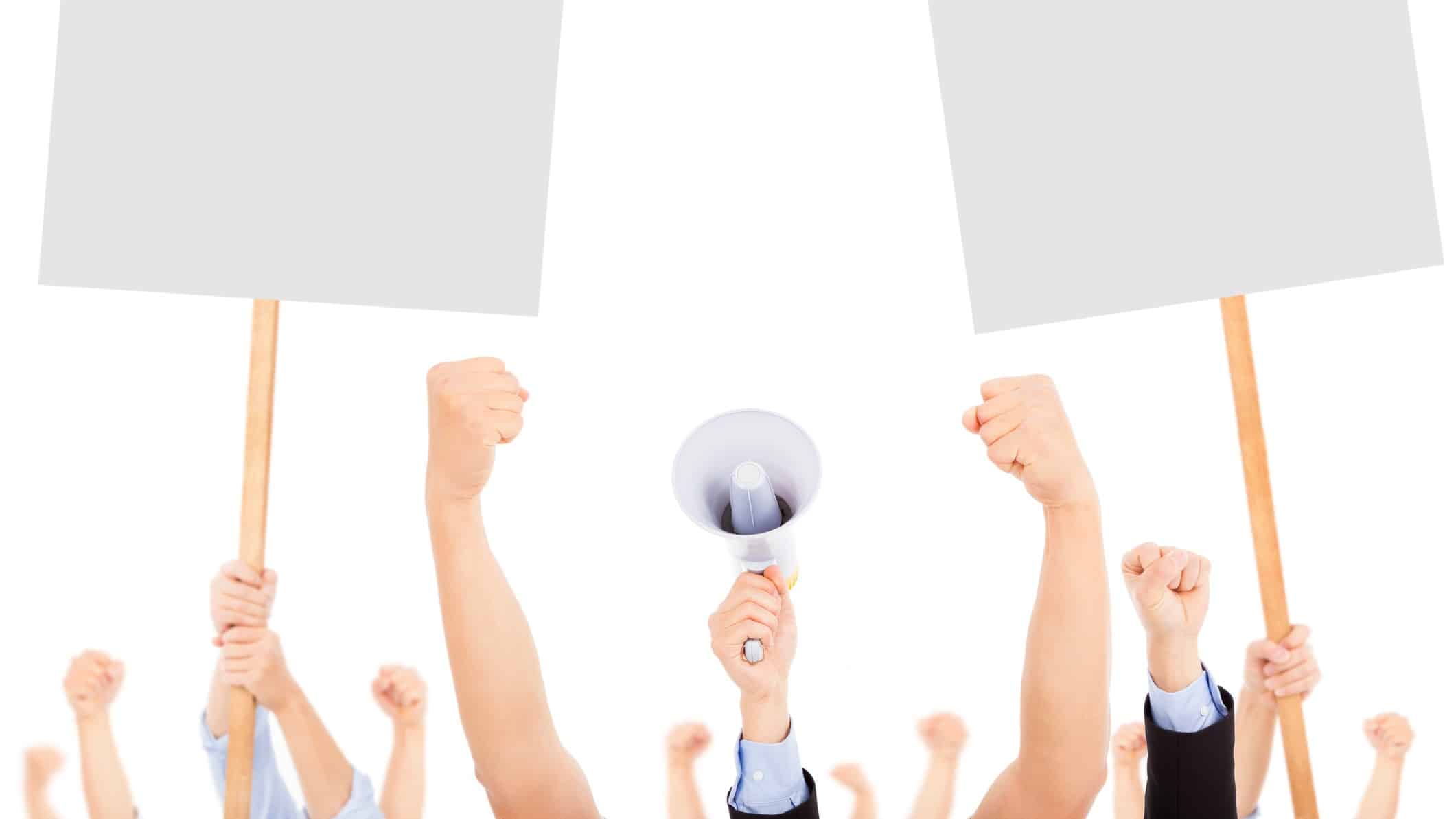 Crowd of angry investors protesting with bullhorn and placards