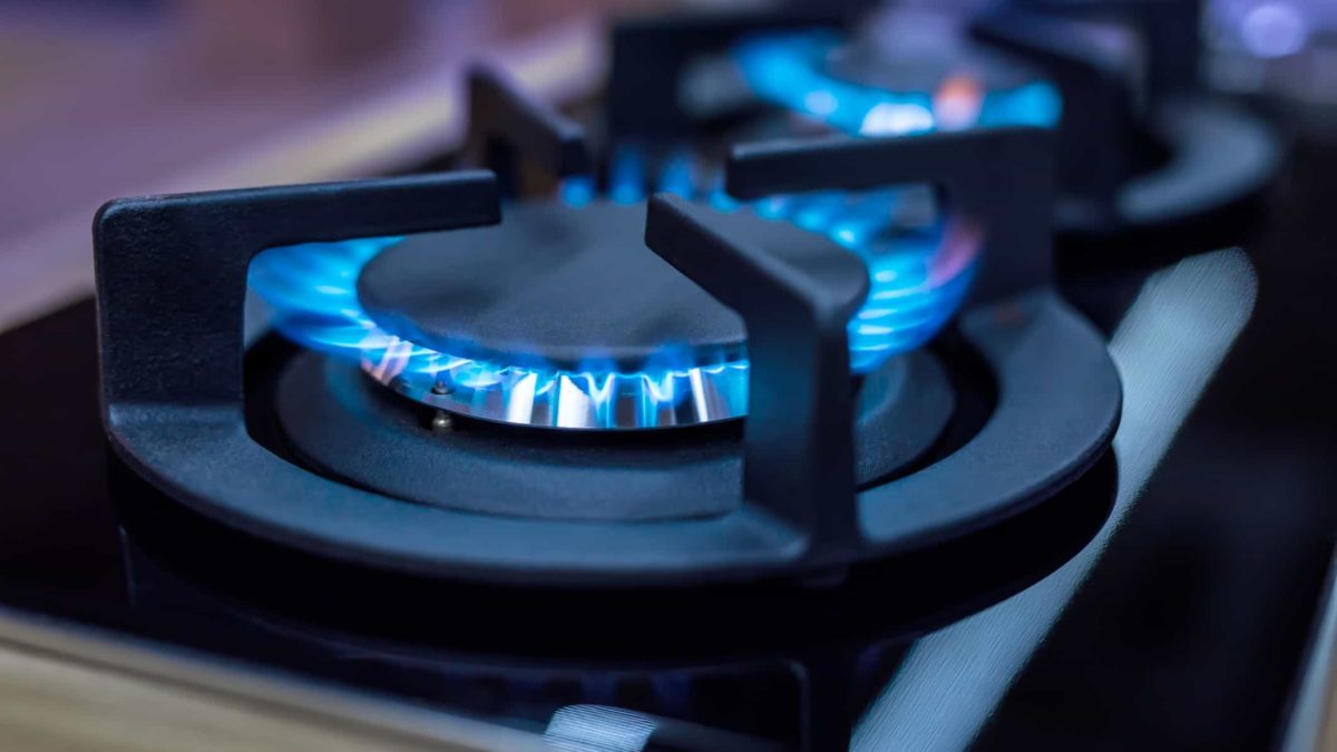 gas burner alight on a stove