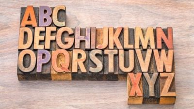wooden blocks depicting letters of the alphabet