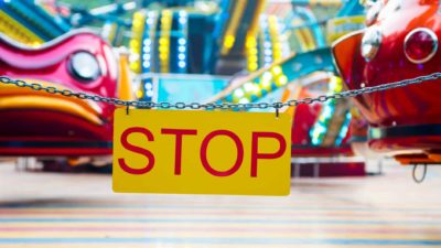 Ardent Leisure theme park with stop sign chained across entrance