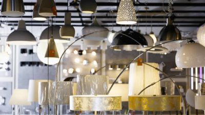 Variety of lighting fixtures displayed in a shop representing Beacon Lighting share price