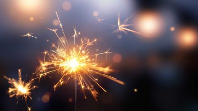 sparkler at celebration representing rising spark infrastructure share price
