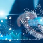 Graphic illustration of buy now pay later technology overlaid on blurred photo of businessman on tablet
