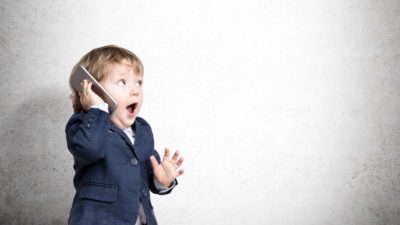 toddler in business attire representing asx shares beginner investor