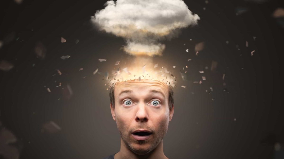 A man looks stunned as a cloud explodes from his head representing the CogState share price crashing today in
