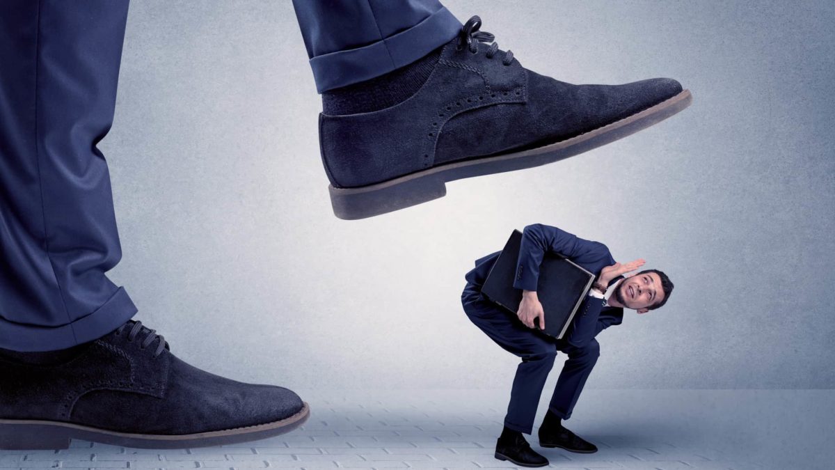 giant pair of shoes about to stand on miniature investor of bitcoin and asx shares