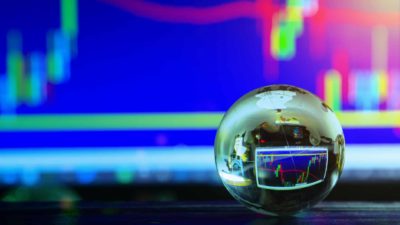 crystal ball reflecting NASDAQ stock charts
