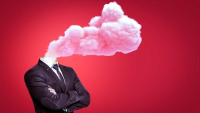 headless business man with smoke pouring from neck representing interest rate hike impact on ASX shares