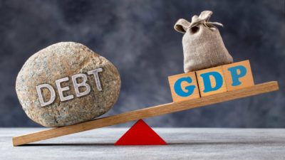 Dedt outweighs GDP on a seesaw indicating global financial crisis