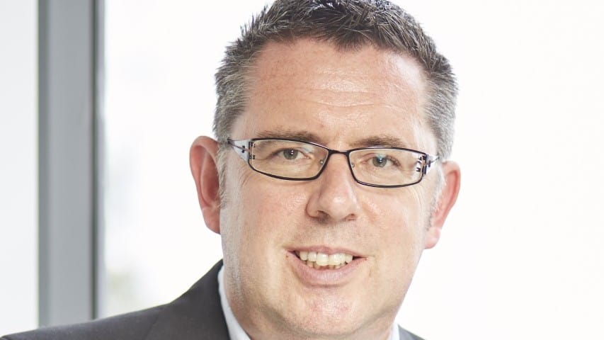 head shot of an executive from H & R Block