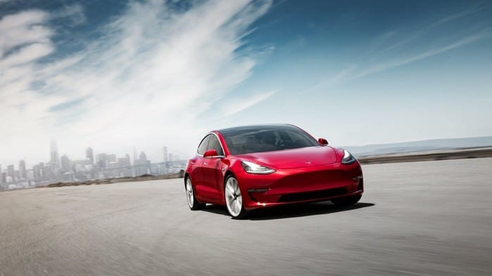 Red Tesla electric car