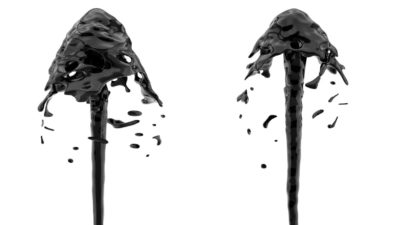 Two fountains of black oil in the shape of up arrows signalling oil price rise