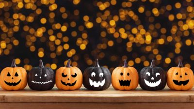 asx growth shares for october represented by miniature jack o lantern pumpkins