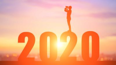 asx shares and REITs outlook represented by man standing on giant 2020 looking out with binoculars