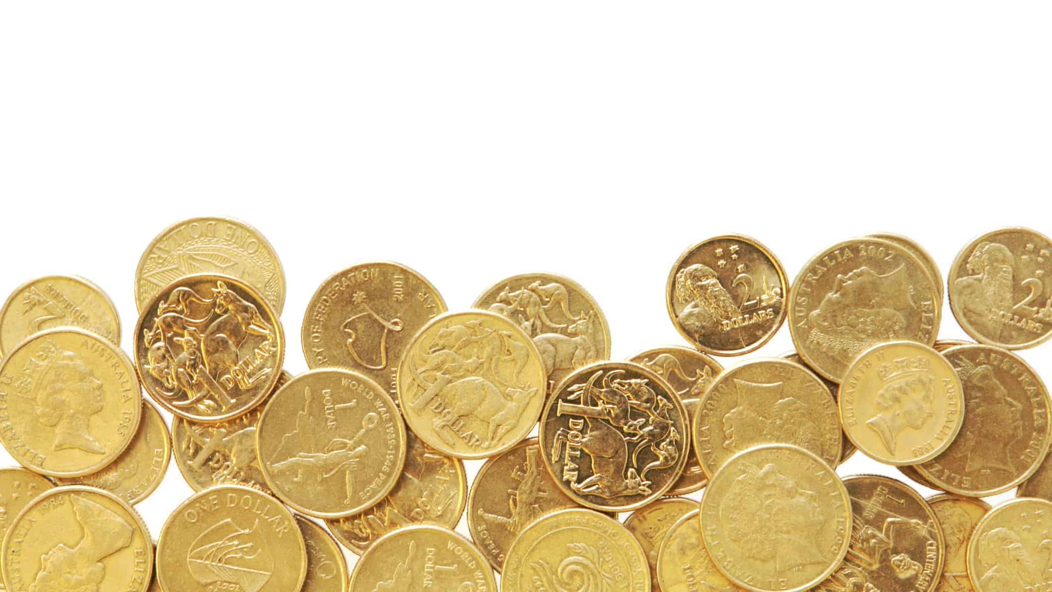 bargain stocks represented by one and two dollars coins in a pile