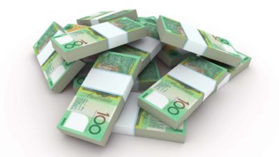 janus henderson share price increasing represented by pile of australian one hundred dollar notes