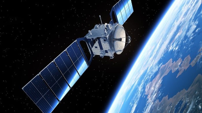 asx share price represented by high tech computing space satellite pictured floating above earth in space