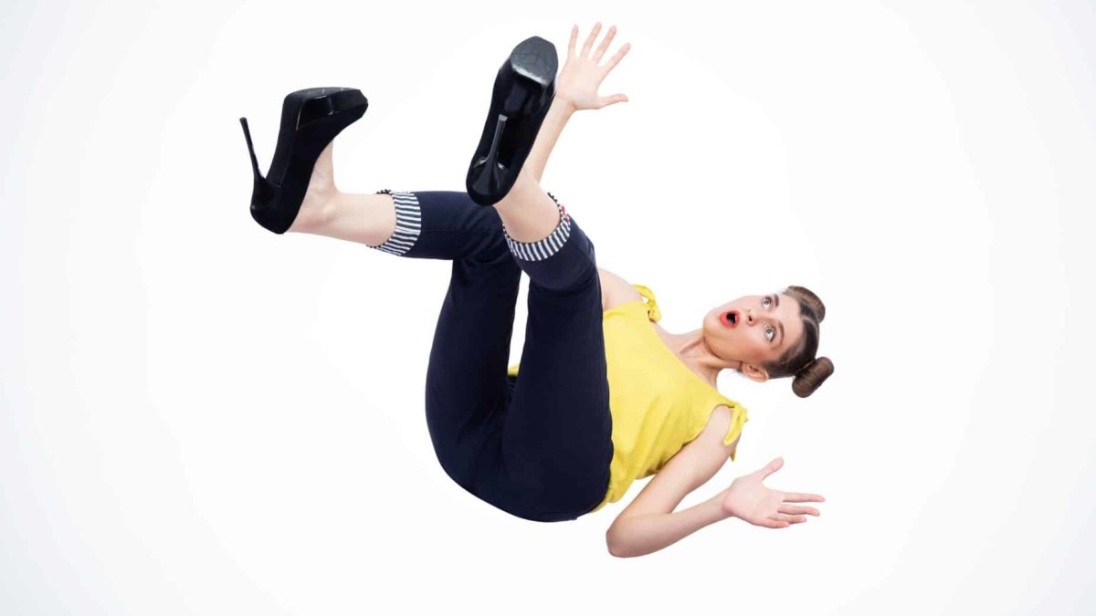 falling asx share price represented by woman falling through mid air