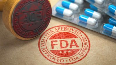 rising medical asx share price represented by FDA approval stamp
