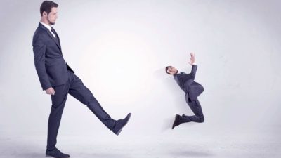asx share price resignation represented by man kicking miniature man through the air