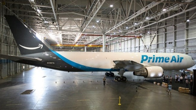 amazon stock represented by amazon prime jet plane in hanger