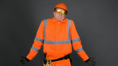 energy asx share price flat represented by worker in hi vis gear shrugging
