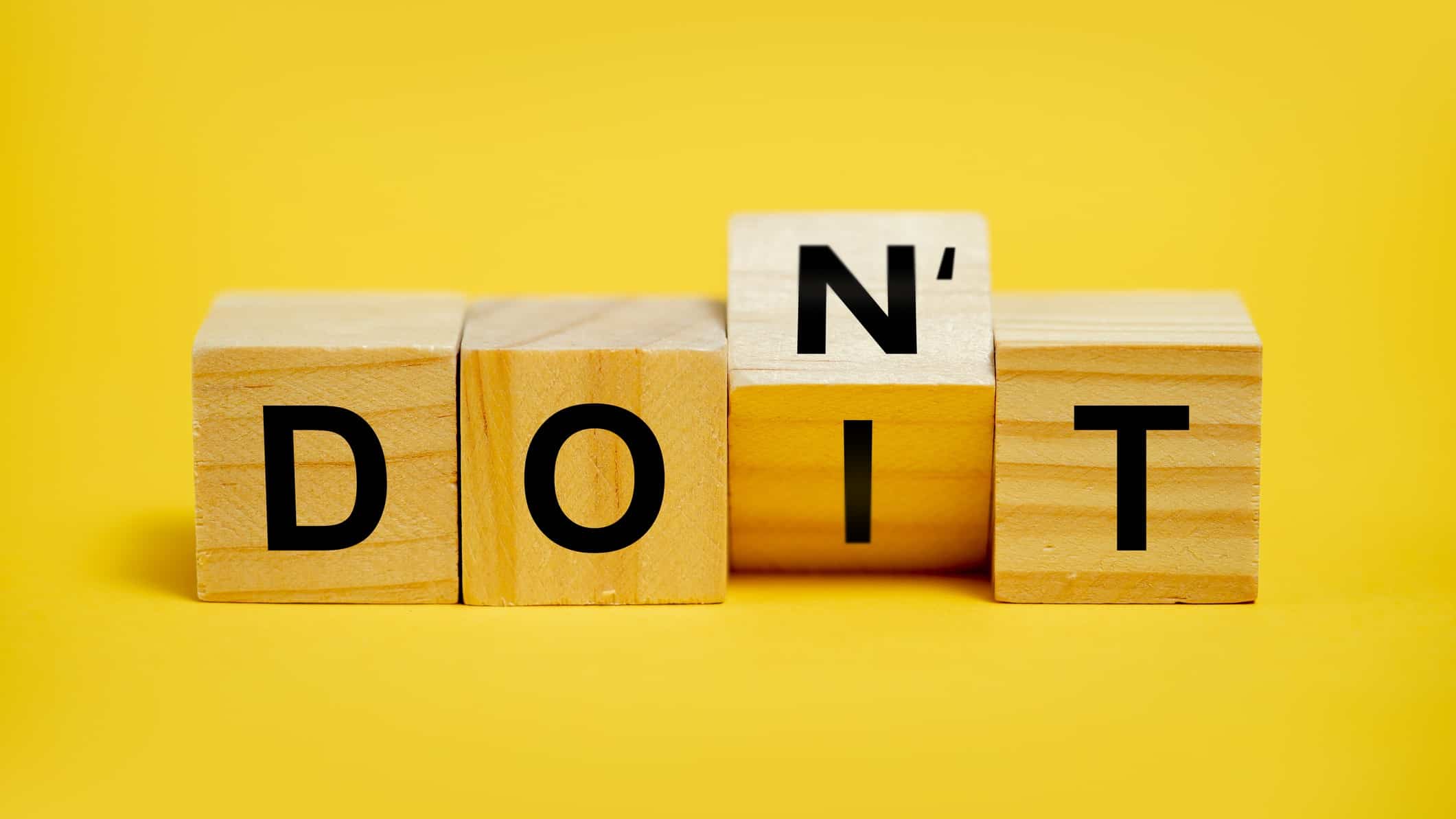 asx shares to avoid buying represented by wooden blocks spelling do it or don't