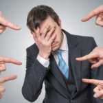 asx share penalty represented by lots of fingers pointing at disgraced businessman Crown royal commission WA