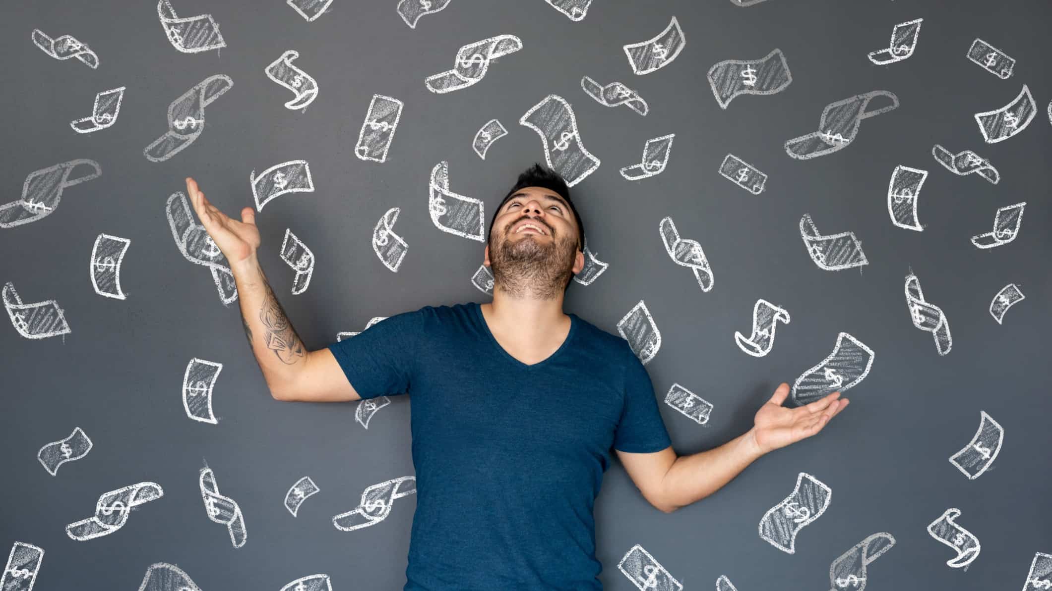 rising asx share price represented by man with arms raised against blackboard featuring images of dollar notes