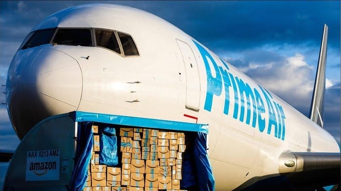 Amazon stock represented by Amazone air plane with prime air printed on it