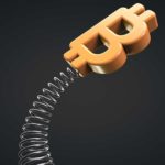 A Bitcoin symbol atop a spring, indicating the uncertain direction of cryptocurrency as a commodity