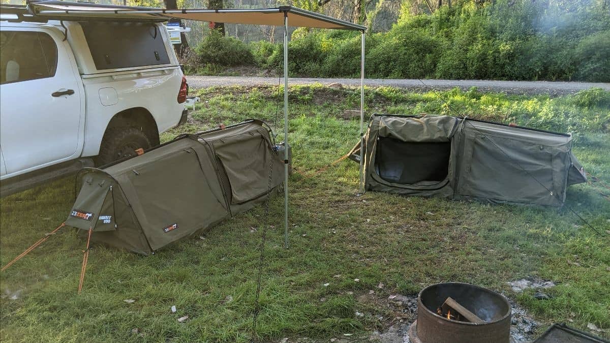 investing and camping analogy represented by camp side next to ute