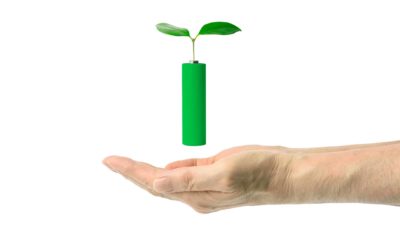 A hand holds a green lithium battery with a leaf, indicating positive share price movement for clean ASX lithium miners