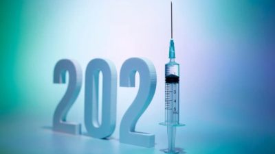 covid vaccine shares represented by numbers 2021 with the one displayed as syringe