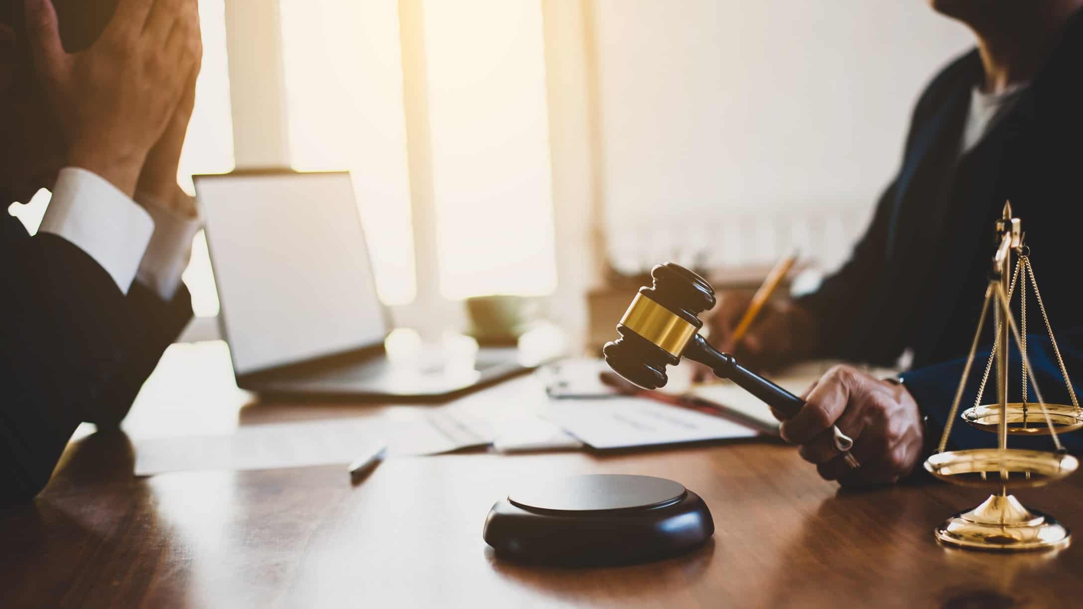 A sobbing businessman accused of wrongdoing faces justice