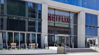netflix shares represented by outside view of netflix corporate office in Los Angeles