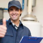 A plumber gives the thumbs up