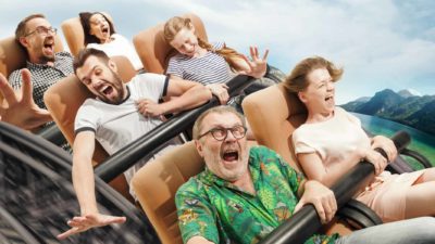 Scared people on a rollercoaster holding on for dear life, indicating a plummeting share price