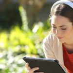 Woman watching video on an Apple iPad.