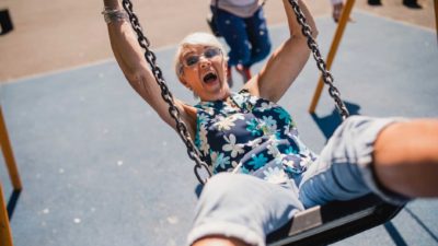 asx share price swing represented by old lady on swing